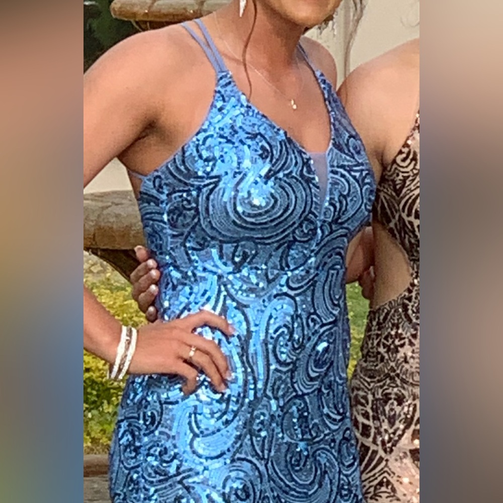 Beautiful blue sequin dress with a gorgeous cross back. (Size 2)